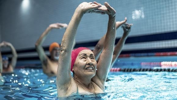 Woman taking part in a swimming lesson